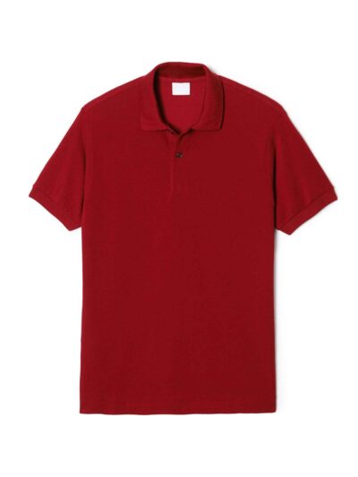Close-up of hospitality polo shirt. Breathable knit fabric, fine stitching. Burgundy color with subtle contrast collar detail