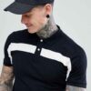 Close-up of a well-tailored polo shirt. Notice the fine pique knit texture, clean stitching, and classic collar. Looks breath