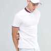 Close-up of navy polo shirt. Fine pique knit, clean stitching detail. Business casual team uniform. Breathable & durable. - V