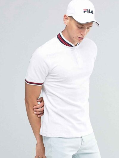 Close-up of navy polo shirt. Fine pique knit, clean stitching detail. Business casual team uniform. Breathable & durable. - V