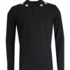 Close-up of a custom polo shirt, fine-knit pique fabric, neat stitching. Shows classic collar, short sleeves, school uniform