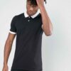 Close-up of a well-stitched polo shirt with button placket. Notice the textured fabric and durable construction, hints of nav