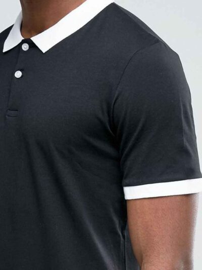 Close-up of a well-stitched polo shirt with button placket. Notice the textured fabric and durable construction, hints of nav
