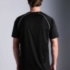Men's oversized tee and shorts set, textured fabric, custom embroidery detail. Relaxed fit, soft drape. Likely cotton blend,