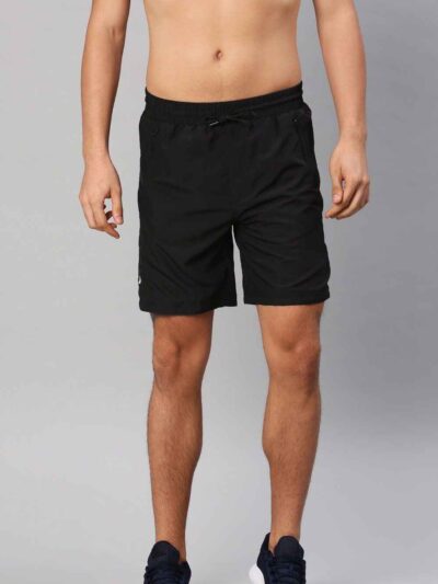Close-up: Athletic shorts in a heathered dark gray. Notice the smooth, performance fabric and reinforced stitching. Hidden zi
