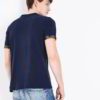 Close-up of a custom-printed t-shirt. Fine, tight knit fabric. Vibrant, detailed graphic. Strong, even stitching. Rich, dark