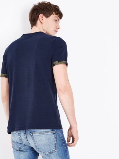 Close-up of a custom-printed t-shirt. Fine, tight knit fabric. Vibrant, detailed graphic. Strong, even stitching. Rich, dark