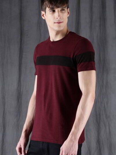 Close-up of a custom printed t-shirt. Soft, heather grey fabric. Clean, durable stitching around the collar and sleeves. Vibr
