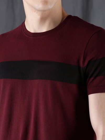 Close-up of a custom printed t-shirt. Soft, heather grey fabric. Clean, durable stitching around the collar and sleeves. Vibr