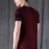 Close-up of a custom printed t-shirt. Soft, heather grey fabric. Clean, durable stitching around the collar and sleeves. Vibr
