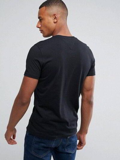 Soft, personalized kids' t-shirt. Bright custom print on smooth, breathable cotton. Fine stitching visible. Short-sleeved, co