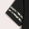 Close-up of a custom-printed t-shirt. Soft cotton texture, vibrant logo. Double-stitched seams for durability. Stylish & comf