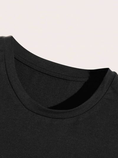Close-up of a custom-printed t-shirt. Soft cotton texture, vibrant logo. Double-stitched seams for durability. Stylish & comf