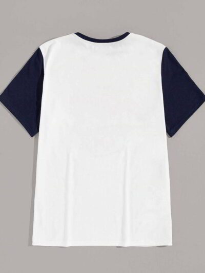 Close-up of event tee shirts. Soft cotton knit, vibrant print, clean seams. Short-sleeve, crew neck. Dark blue and white. - V