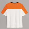 Close-up cotton t-shirt, vibrant custom print. Fine stitching detail, soft fabric texture visible. Promotional garment, brigh