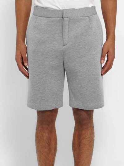 Lightweight surf shorts in a teal and navy pattern. Note the fine stitching and fast-drying woven fabric. Perfect beachwear!