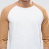 Soft, retail-ready t-shirts wholesale. Close-up shows smooth fabric, quality stitching. Customizable tee, light heather grey,