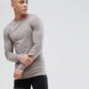 Close-up of a soft, heather grey t-shirt. Notice the fine stitching and comfortable feel. Perfect blank canvas for custom des
