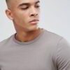 Close-up of a soft, heather grey t-shirt. Notice the fine stitching and comfortable feel. Perfect blank canvas for custom des