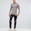 Close-up of a soft, heather grey t-shirt. Notice the fine stitching and comfortable feel. Perfect blank canvas for custom des