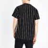 Close-up of soft, breathable t-shirt fabric. Vibrant, high-quality custom print. Double-stitched seams enhance durability. So