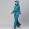 Women's tracksuit set: close-up showing soft, heather gray fabric, elastic waistband joggers, and neat stitching. Athleisure