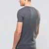 Close-up of vibrant customized t-shirts showing smooth, soft fabric texture and precise stitching. Solid colors hint at easy