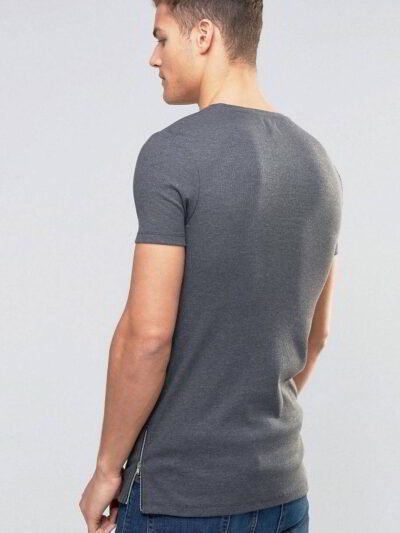 Close-up of vibrant customized t-shirts showing smooth, soft fabric texture and precise stitching. Solid colors hint at easy