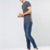 Close-up of vibrant customized t-shirts showing smooth, soft fabric texture and precise stitching. Solid colors hint at easy