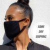 Soft, reusable face mask in a cheerful floral print. Close-up shows fine cotton weave and durable stitching. Washable and com