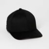 Close-up of soft, organic cotton cap; visible stitching, textured fabric. Comfortable headwear, muted earthy tones. Ethical f