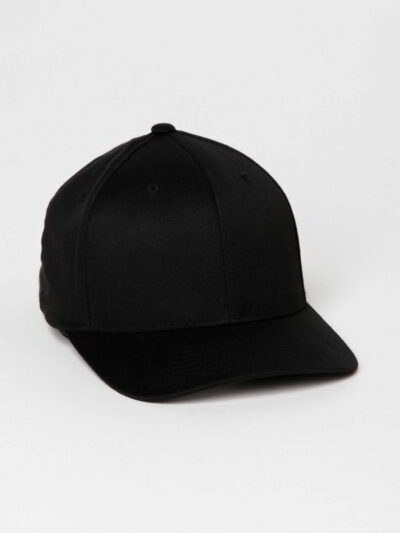 Close-up of soft, organic cotton cap; visible stitching, textured fabric. Comfortable headwear, muted earthy tones. Ethical f