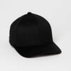 Close-up of soft, organic cotton cap; visible stitching, textured fabric. Comfortable headwear, muted earthy tones. Ethical f