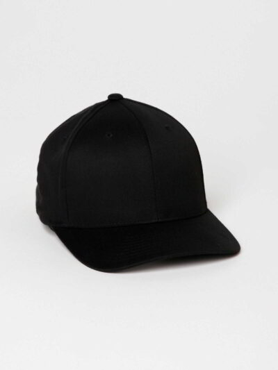 Close-up of soft, organic cotton cap; visible stitching, textured fabric. Comfortable headwear, muted earthy tones. Ethical f