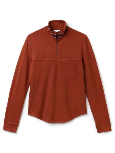 Zippered polo shirt. Soft-touch cotton fabric, stand-up collar, subtle texture. Fine stitching detail visible on a custom gar