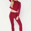 Sportswear tracksuits: close-knit fabric, contrast piping. Zippered jacket, tailored fit pants. Durable training gear with de