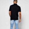Polo shirts with delicate floral embroidery, soft textured fabric, and subtle stitching. High-quality cotton blend. Perfect f