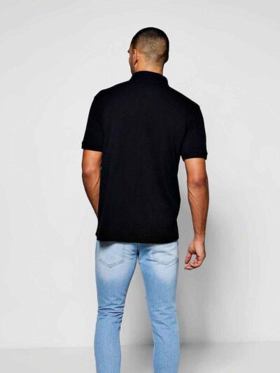 Polo shirts with delicate floral embroidery, soft textured fabric, and subtle stitching. High-quality cotton blend. Perfect f