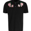 Polo shirts with delicate floral embroidery, soft textured fabric, and subtle stitching. High-quality cotton blend. Perfect f