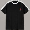 White t-shirt with vibrant floral print, striped panel, and color-blocked design. Soft, breathable knit fabric; clean, durabl