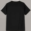 White t-shirt with vibrant floral print, striped panel, and color-blocked design. Soft, breathable knit fabric; clean, durabl