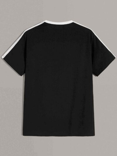 White t-shirt with vibrant floral print, striped panel, and color-blocked design. Soft, breathable knit fabric; clean, durabl