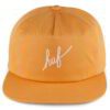 Close-up of a structured baseball cap. Front embroidered script, likely cotton twill texture, crisp stitching. Great for team