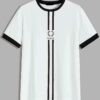 Striped ringer tee featuring custom letter graphic. Soft knit texture, durable stitched seams. Contrasting collar & cuffs add