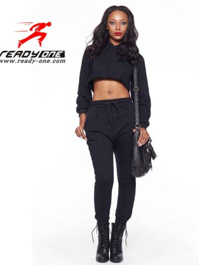 Girls' black crop top sweatsuit. Soft, cozy fleece. Ribbed cuffs, clean stitching. Perfect for active kids or lounging. Dark,