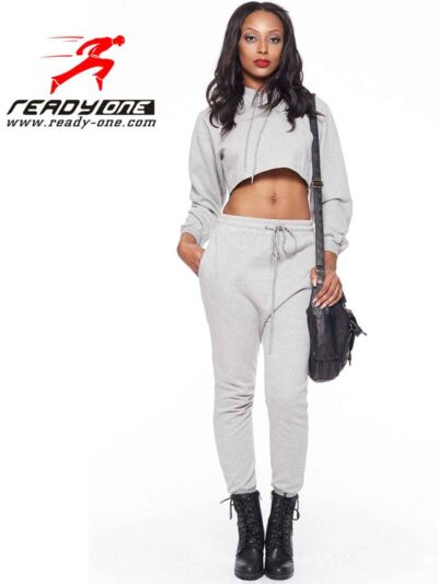 Girls' black crop top sweatsuit. Soft, cozy fleece. Ribbed cuffs, clean stitching. Perfect for active kids or lounging. Dark,
