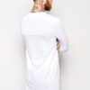 Black elongated tee. Soft, drapey fabric. Note the stylish side zipper detail and clean stitching. Minimalist, modern look. -