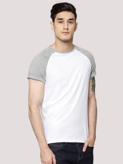Close-up on a smooth, finely-knitted t-shirt. Notice the tight stitching and soft drape, hints of premium cotton in solid col