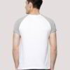 Close-up on a smooth, finely-knitted t-shirt. Notice the tight stitching and soft drape, hints of premium cotton in solid col