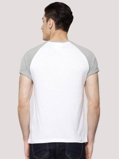 Close-up on a smooth, finely-knitted t-shirt. Notice the tight stitching and soft drape, hints of premium cotton in solid col
